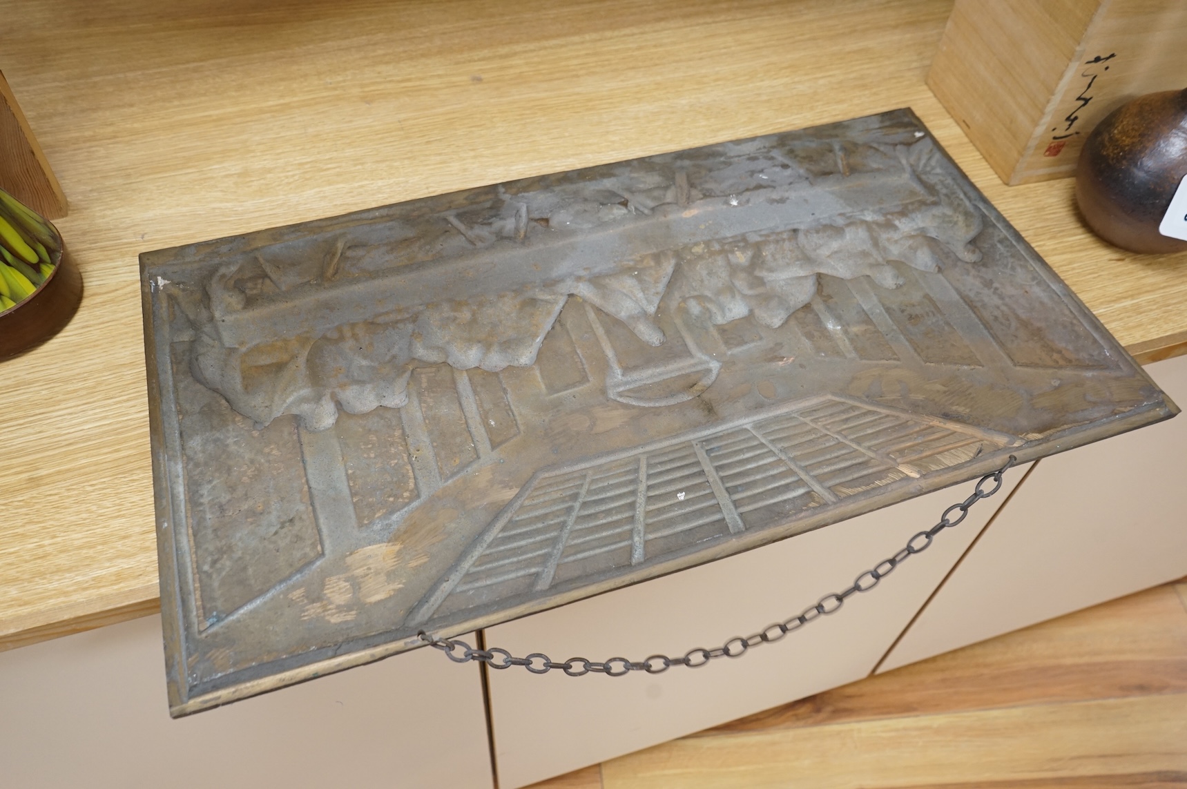 A bronze plaque of ‘The Last Supper’, 65cm x 35cm